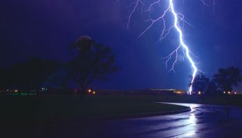 view of a bolt of lightning hitting the ground