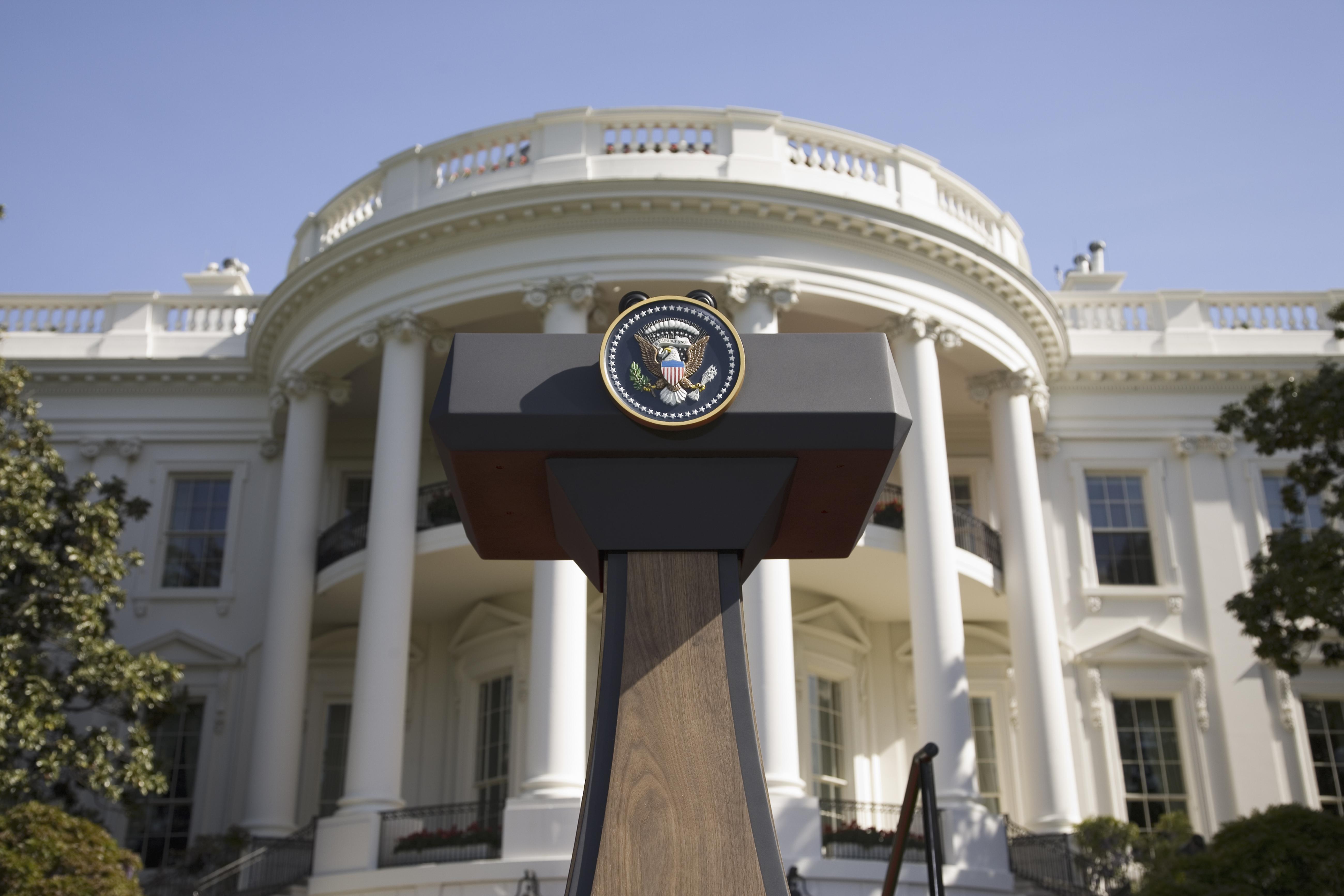 USA, Washington DC, Presidential Seal on podium in front of The White House, low angle view