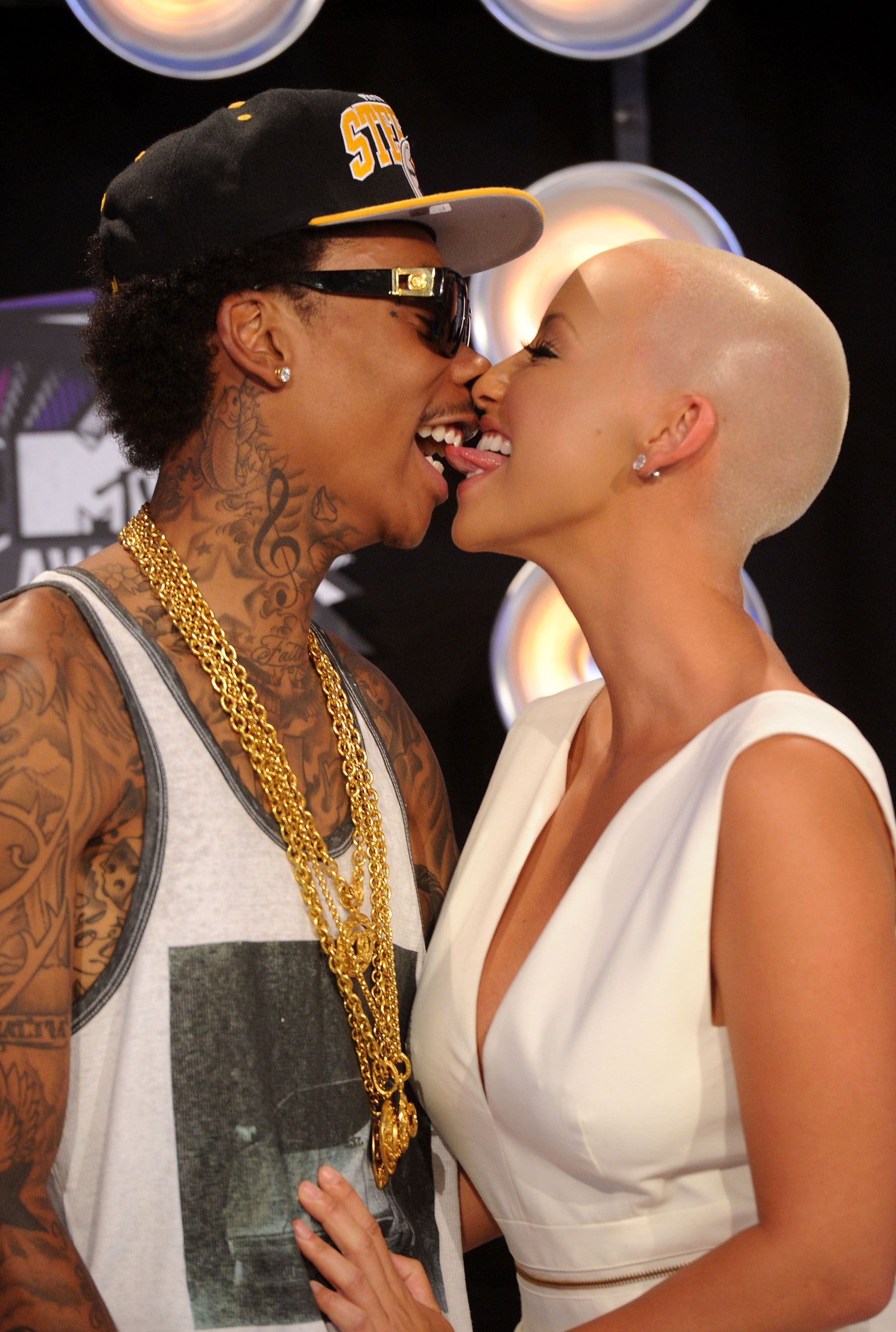 Amber Rose Gets Giant Forehead Tattoos in Honor of Her Sons Pics   Entertainment Tonight