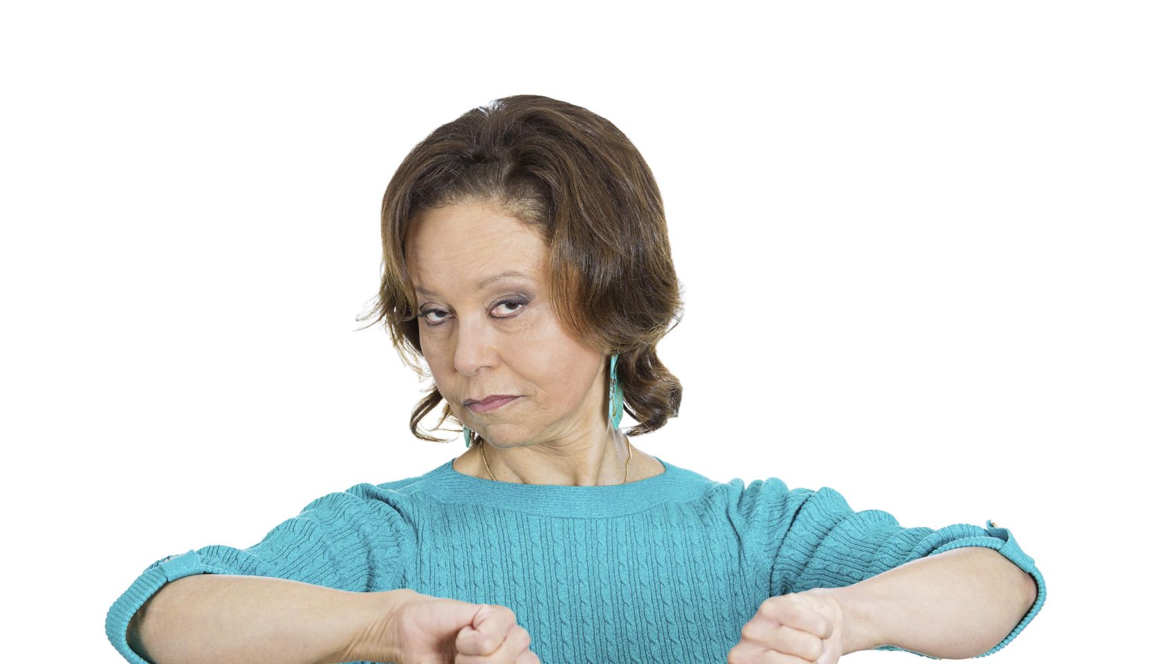 Closeup portrait, unhappy business woman, wife, giving thumbs down sign gesture looking with negative expression and disapproval, isolated white background. Human emotion facial expression, feeling