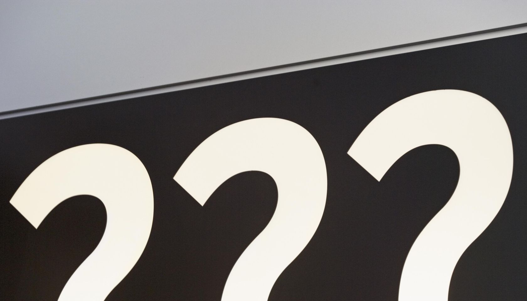 Question marks on sign