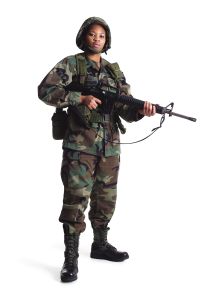 a young african american female soldier stand in fatighues with her gun