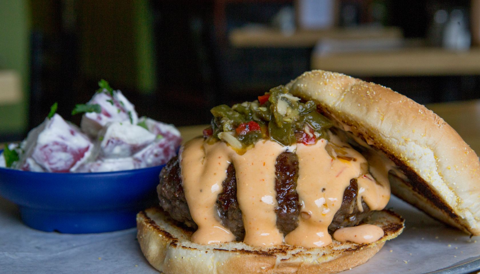 Hamburger with Spicy Melted Cheese and Potato Salad