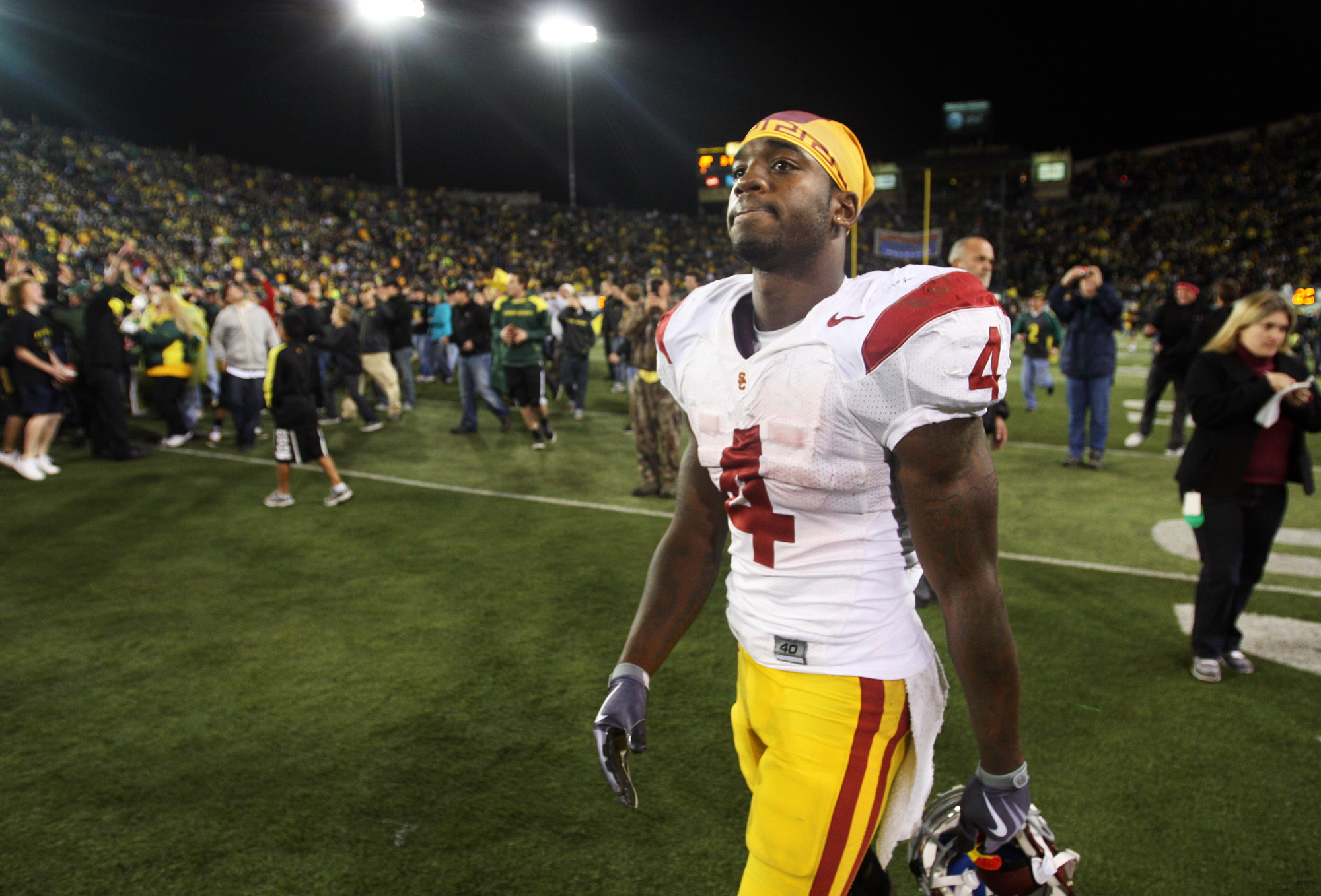 EUGENE, OREGON OCTOBER 31, 2009USC's Joe McKnight walks off the field as fans celebrate the Oregon