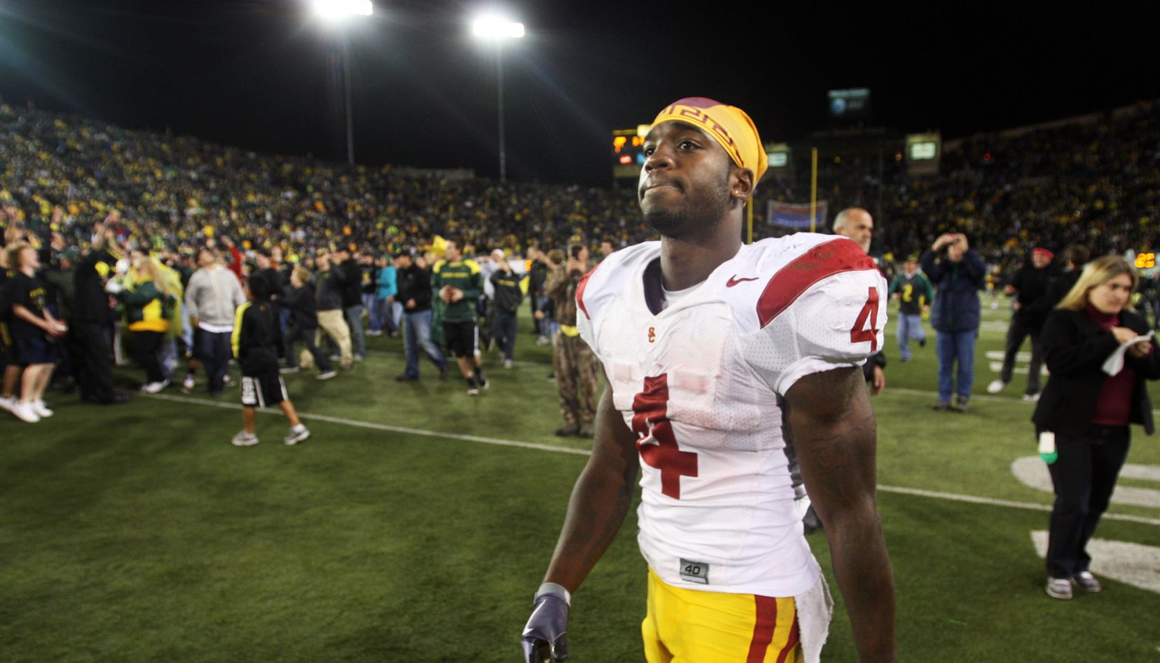 EUGENE, OREGON OCTOBER 31, 2009USC's Joe McKnight walks off the field as fans celebrate the Oregon