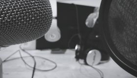 Microphone And Headphones In Studio