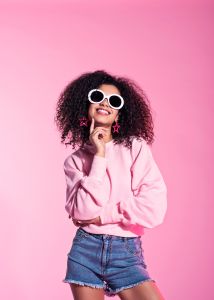 Young afro woman wearing sunglasses