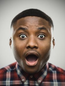 Close-up portrait of shocked man