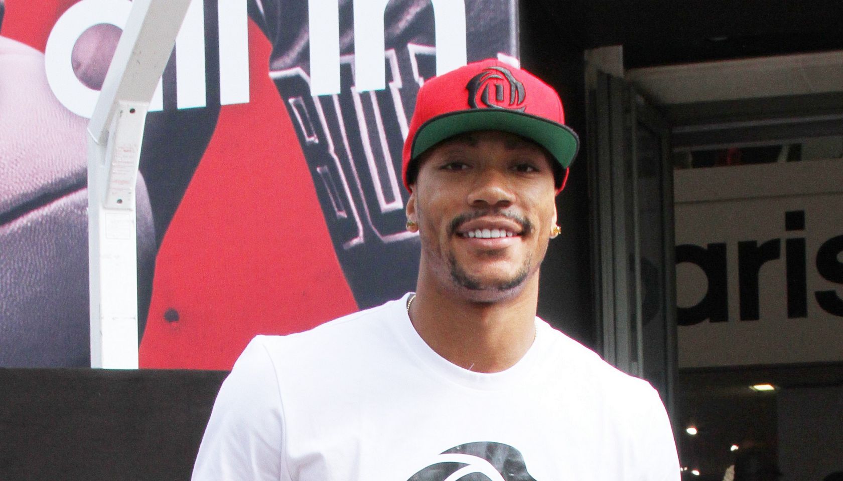 Chicago Bulls player Derrick Rose attends an in-store Adidas promotional event near Champs Elysees