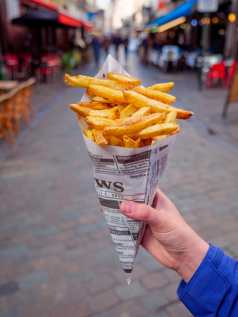 Bag of Belgian fries or frites in Brussels, Belgium
