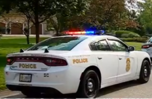 Police at Scene of Man in Water