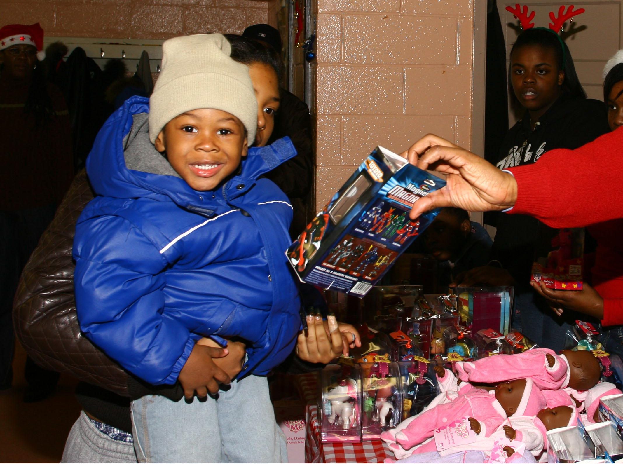Jay-Z Gives Out Presents In Old Neighborhood