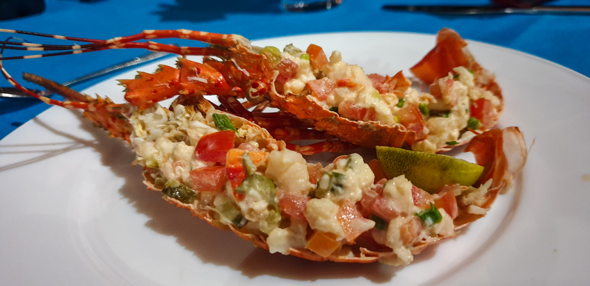 Red barbequed lobster on plate