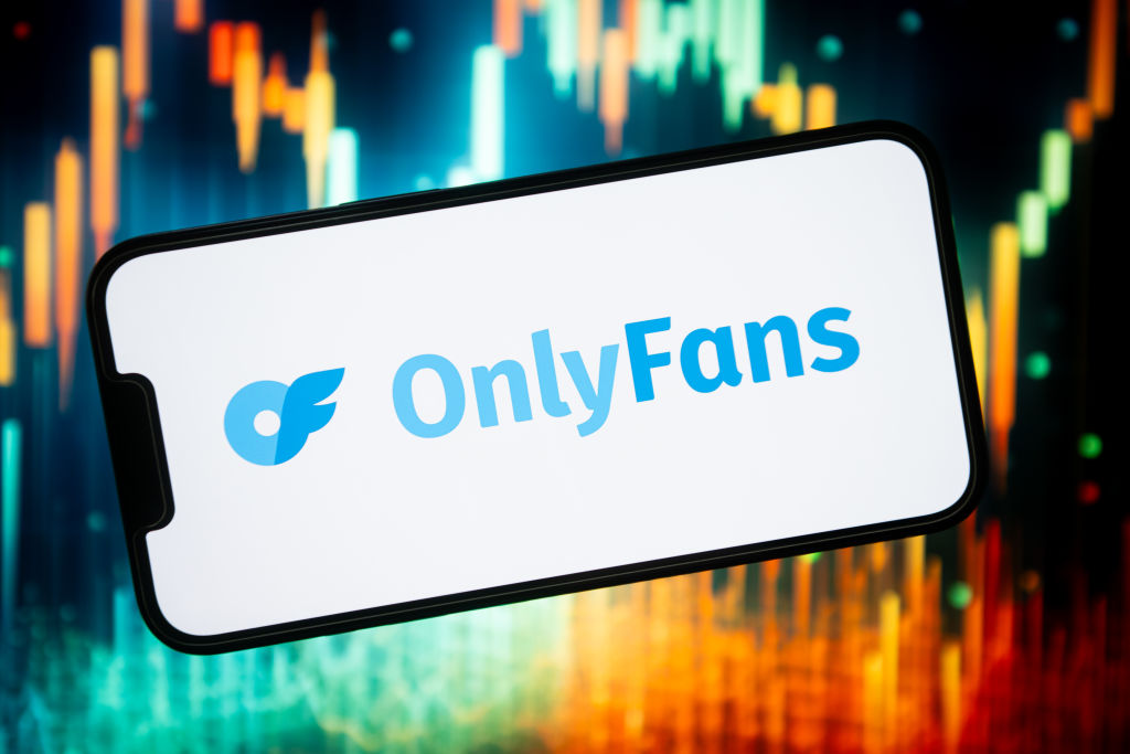 In this photo illustration, an Only Fans logo seen displayed